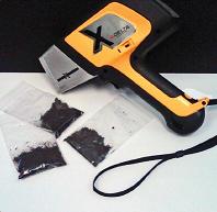 Detla Handheld XRF with soil samples