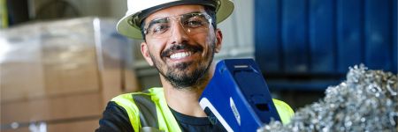 General Manager Tog Valizada of SA Recycling tests scrap with handheld XRF