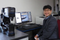 Professor Bo Hyun Kim of Soongsil University with a digital microscope