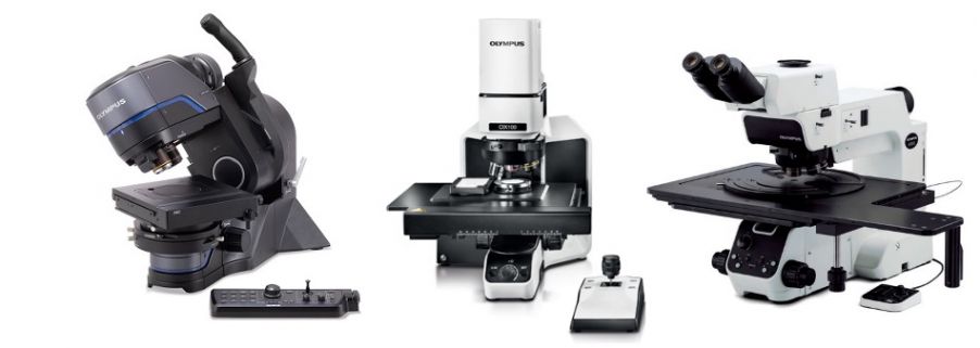 Três microscópios industriais